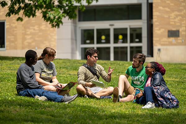 Students conversing outside the campus